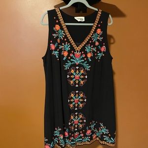 Sleeveless, embroidered dress